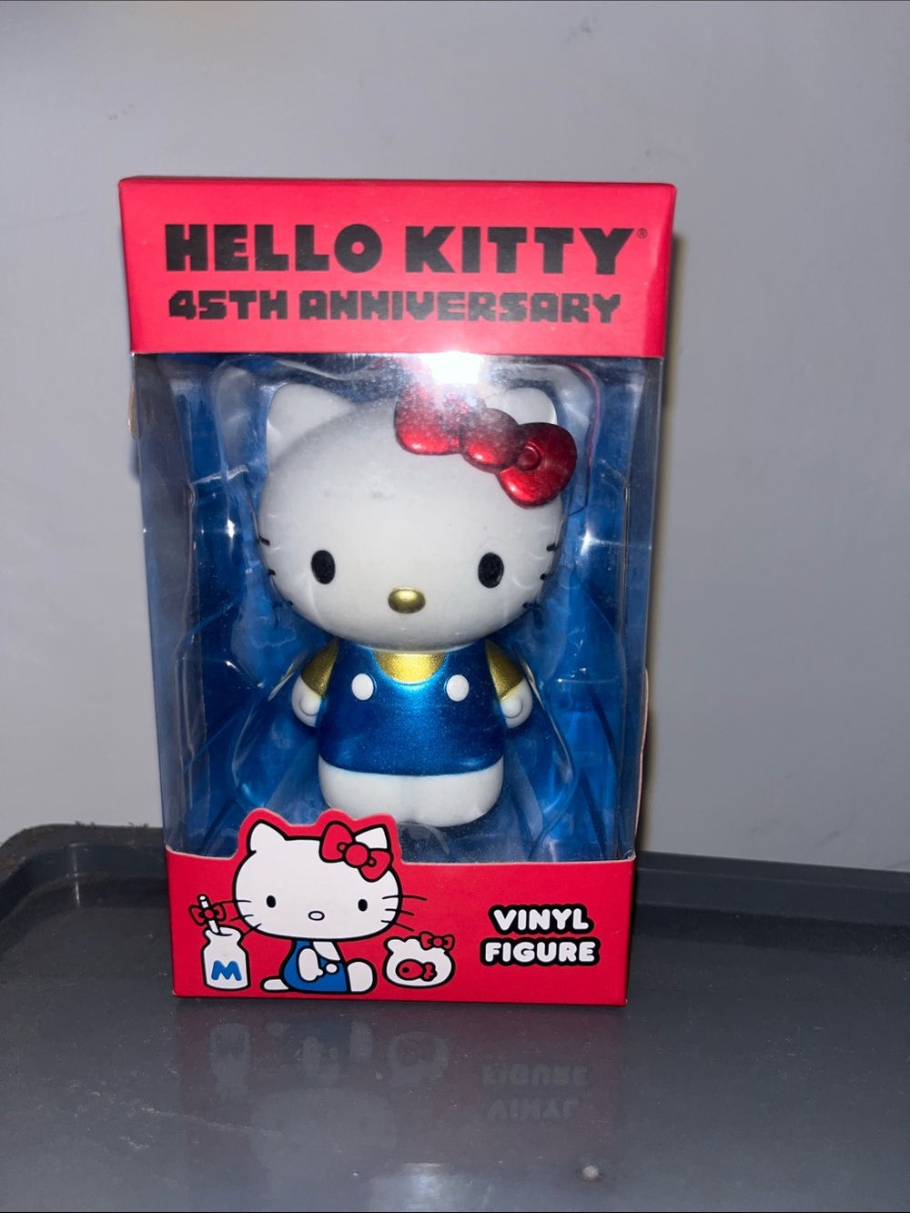 Sanrio x Lootcrate 45th Anniversary Vinyl Figure, Hello Kitty in blue overalls